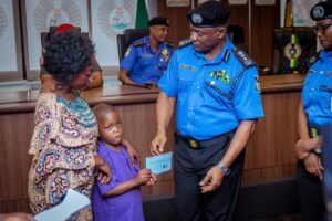 IGP Olatunji Disu presents ₦2.4bn cheques to families of fallen police officers